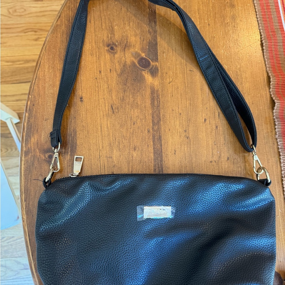 New, BCBG faux leather purse